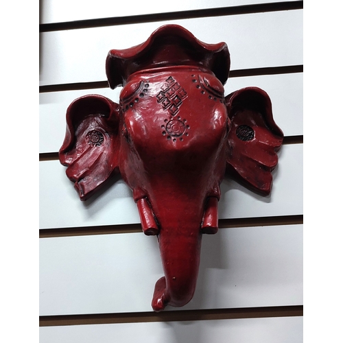 297 - A wall-hanging pottery elephant