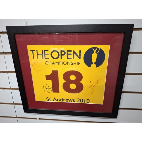 298 - Official British Open memorabilia from the 2010 St Andrews open, signed 18th hole flag stick flag si... 