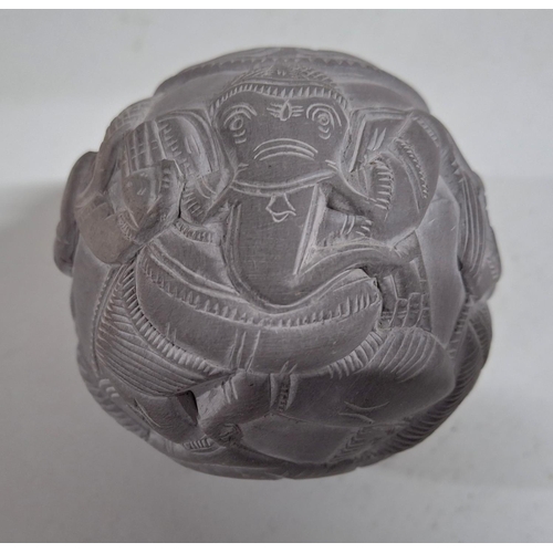 221 - Carved stone circular ball with animal and human form carvings