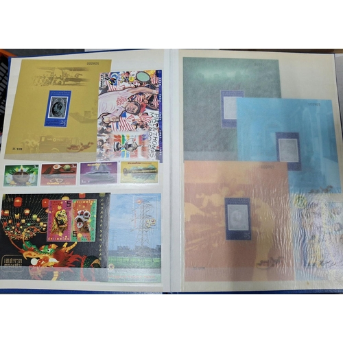 260A - Blue stock book containing a large quantity of modern mint unmounted Thailand and Malaysia stamp set... 