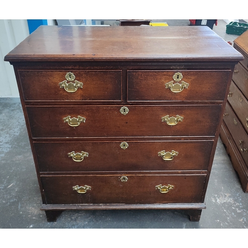 493 - Lewis & Co., Chichester, Oak 2/3 chest of drawers with Brass escutheons and handles