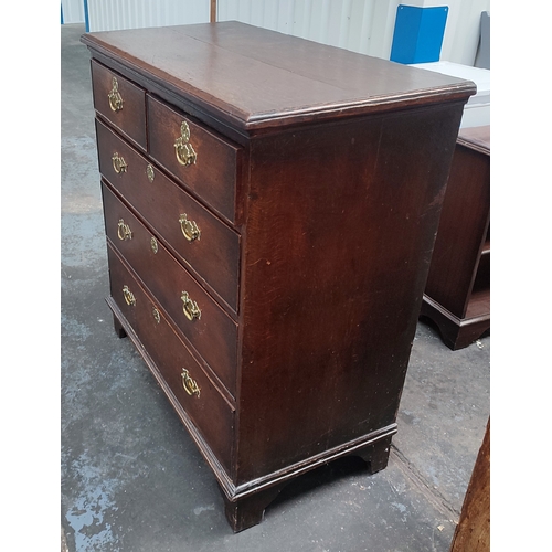 493 - Lewis & Co., Chichester, Oak 2/3 chest of drawers with Brass escutheons and handles