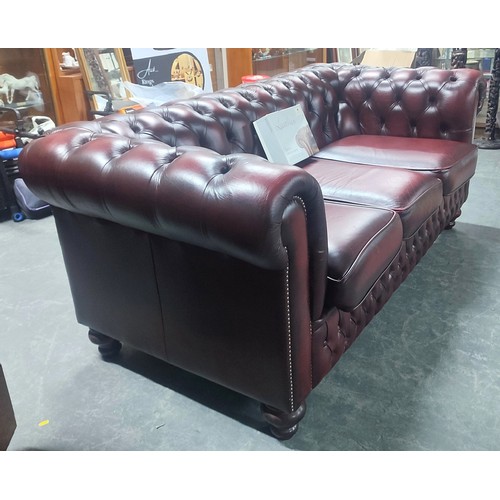 505 - Stunning oxblood Chesterfield sofa with repair kit