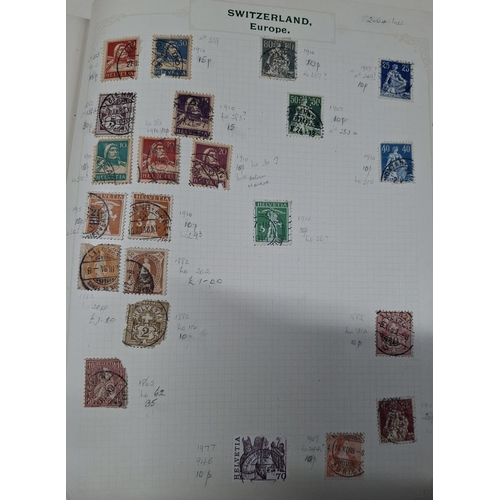 227 - Green stamp album containing old world stamps including early Irish Republic, China etc, both used a... 