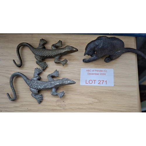 271 - A brass Salamander and a another similar white metal example and a small bronzed cat (3)