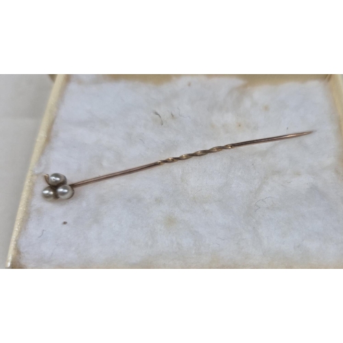 281 - Early 20thC yellow metal tie pin with 3 seed pearly, indistinctly marked (0.7grams) in old Settle, N... 