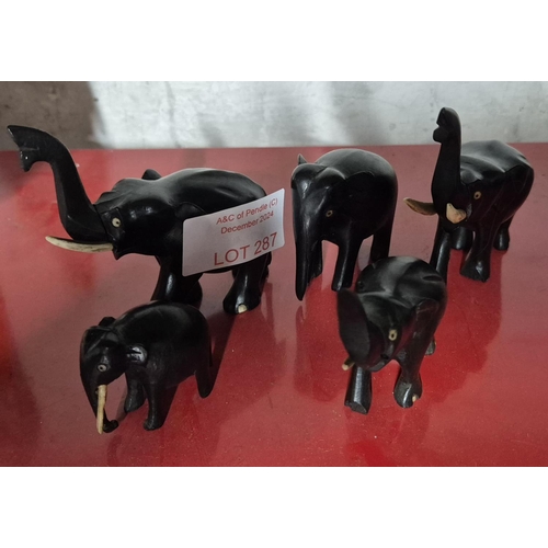 287 - Five ebonised wooden Elephant figurines (5)