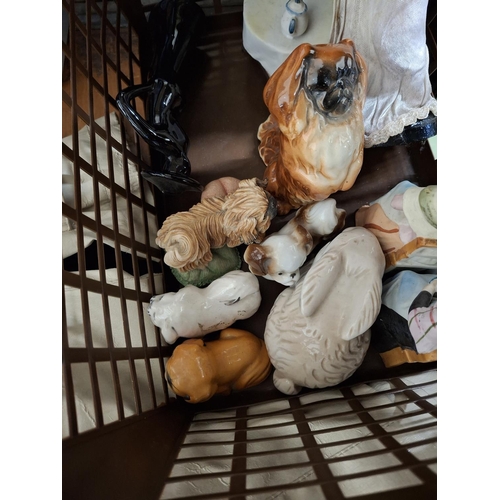 324 - Bronzed small Pekinese dog together with other dog and figure figurines and a doll (Qty)