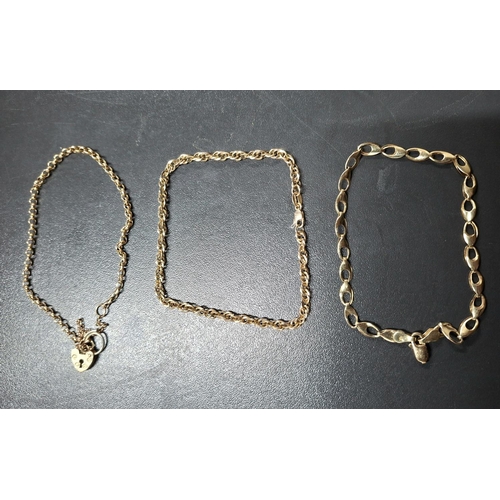 43 - Three 9ct yellow gold bracelets including one with a lock clasp (3),

6.4 grams