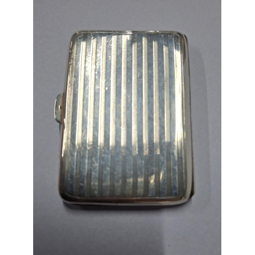 4 - A HALLMARKED 1915 BIRMINGHAM ENGINE TURNED SILVER CIGARETTE CASE