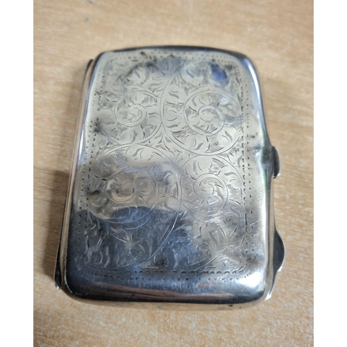 7 - Antique hallmarked silver cigarette case with engraved scroling to either side