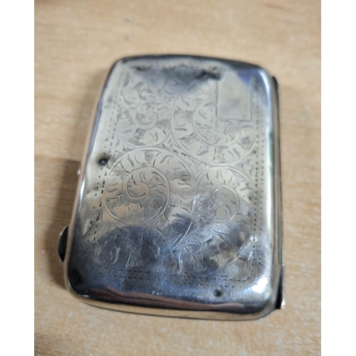 7 - Antique hallmarked silver cigarette case with engraved scroling to either side