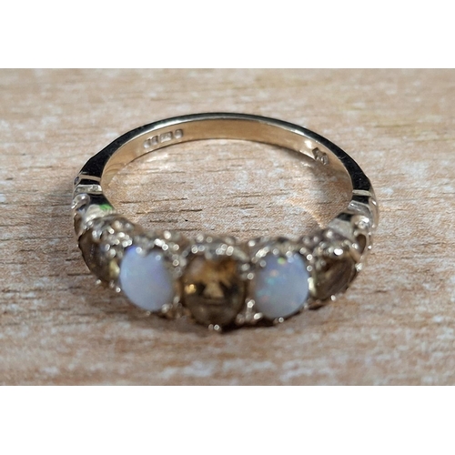 58 - Fully hallmarked 9ct yellow gold ring with alternate smokey Quartz and Opal,

3.3 grams gross       ... 