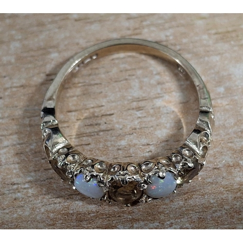 58 - Fully hallmarked 9ct yellow gold ring with alternate smokey Quartz and Opal,

3.3 grams gross       ... 