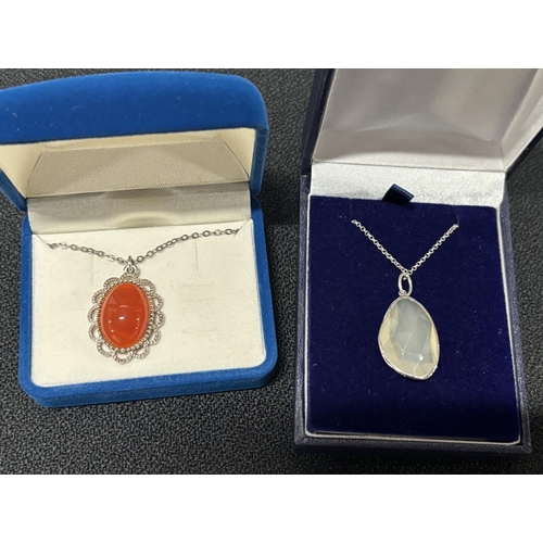 67 - 2 Boxed Silver 925 Necklaces and pendants with Orange stone