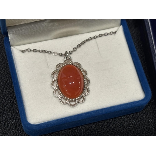 67 - 2 Boxed Silver 925 Necklaces and pendants with Orange stone