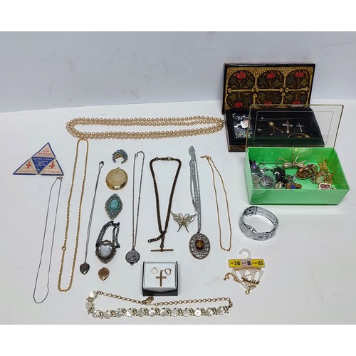 70 - 2 Small boxes of costume jewellery containing a talisman Fob and some Silver items (Qty)