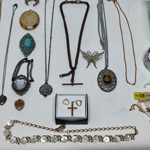 70 - 2 Small boxes of costume jewellery containing a talisman Fob and some Silver items (Qty)