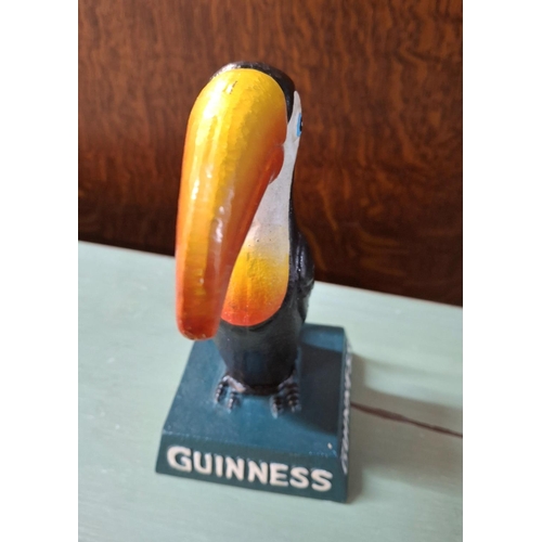 220 - A CAST GUINNESS TOUCAN,

approx 25cm tall