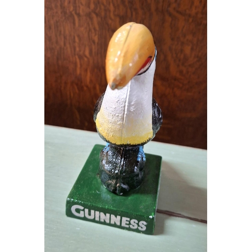 221 - A CAST GUINNESS TOUCAN,

approx 19cm tall