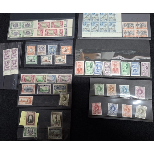 271 - Eight mint and unused stamps and sets on dealer cards, all containing KGV stamps, blocks and sets (Q... 