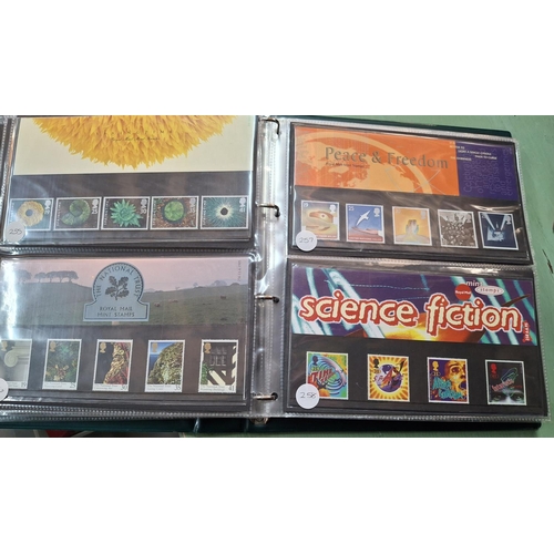 294 - Album of approx 35 GB stamp sets, mid-late 1990s (approx 35 sets)