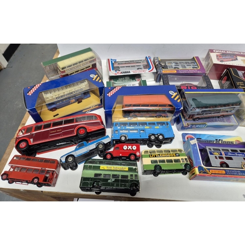 323 - 13 boxed mainly corgi cars/trucks and buses with loose ones