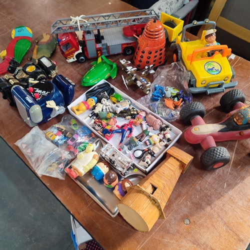 354 - Collection of various toys and figures including Micro-Machines, Spiderman, Winnie The Pooh, a Dalek... 