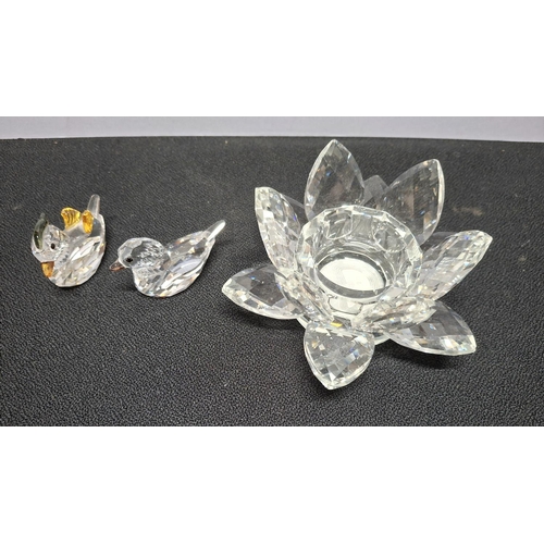 378 - A large Swarovski candle holder in the form of a flower together with 2 Swarovski small Ducks (3)