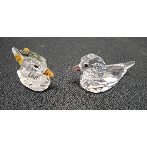 378 - A large Swarovski candle holder in the form of a flower together with 2 Swarovski small Ducks (3)