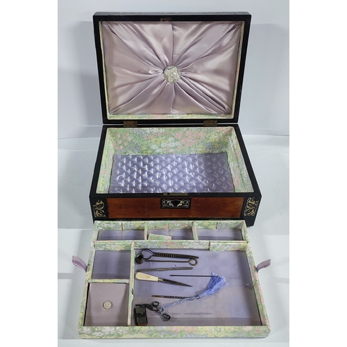 385 - An ornate Victorian inlaid sewing box with contents, some possibly Silver