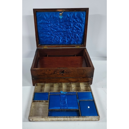 387 - Antique walnut and mother of pearl inlaid writing slope with blue lining and inner compartments