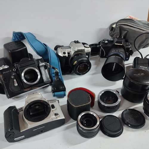 394 - Selection of camera equipment including Olympus, Minolta and various lenses etc. (Qty)