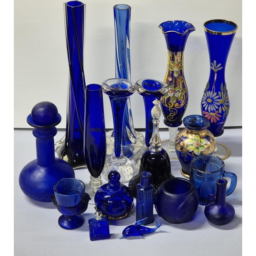 402 - Quantity of various blue glass to include perfume and Chemist bottles, vases including Bohemia glass... 