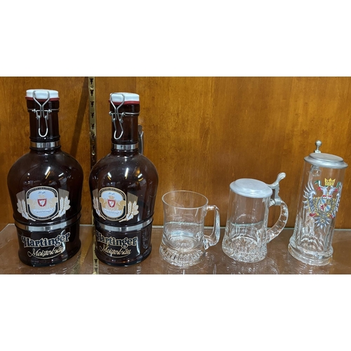 410 - 2 Hartinger Brown bottles with 3 glasses