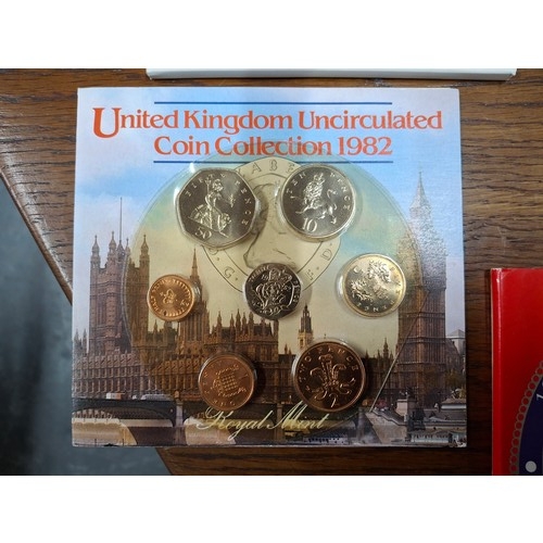 248 - Collection of six GB official coin sets including 1982 and 1997 and a 2018 Royal Mint 