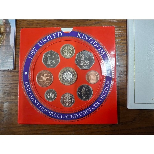 248 - Collection of six GB official coin sets including 1982 and 1997 and a 2018 Royal Mint 