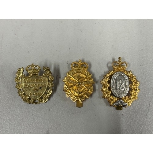 115 - 3 British Cap badges including Queens Rangers