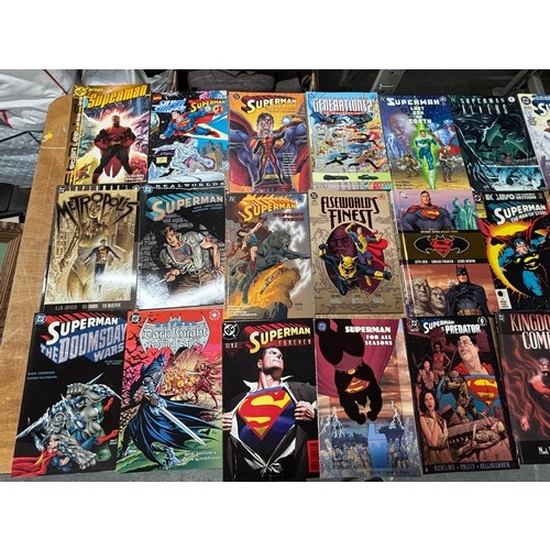 334 - 23 Superman Comics and paperbacks including Superman the Doomsdays Wars