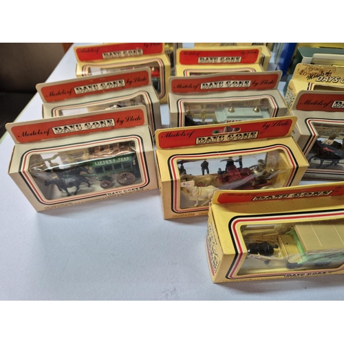 196 - Box of Lledo, boxed as new, vans, buses and horse and coaches (Qty)