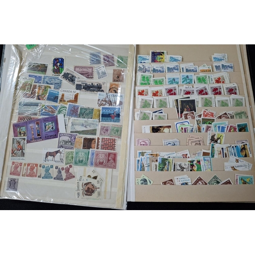 290 - Two stamp albums and loose dealer sheets containing mainly GB, New Zealand and Canada later 20thC (1... 