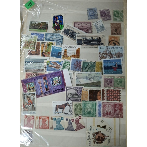 290 - Two stamp albums and loose dealer sheets containing mainly GB, New Zealand and Canada later 20thC (1... 