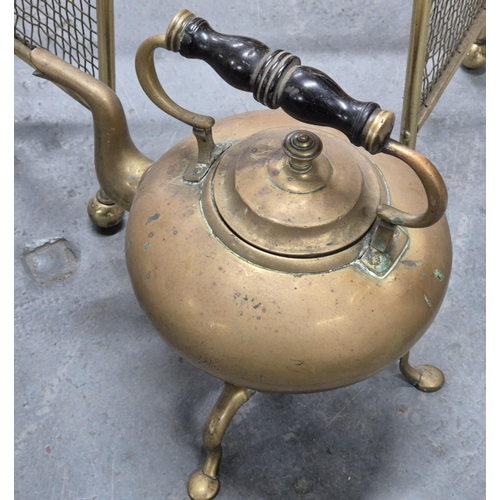 73 - Brass fireguard together with brass kettle on stand (2)