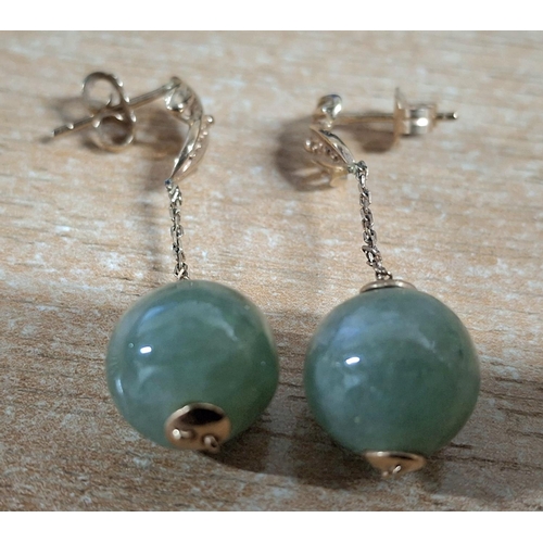 49 - Pair of 585 (14ct) stamped yellow gold earrings with polished Jade green bead,

5.6 grams gross