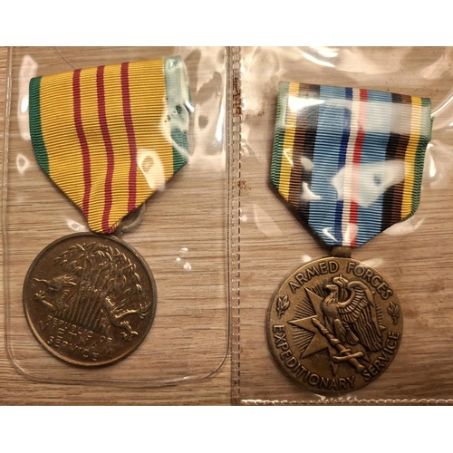 103 - Four USA 20thC medals, Vietnam service medal, Armed Forces Expeditionary medal, Army of Occupation o... 