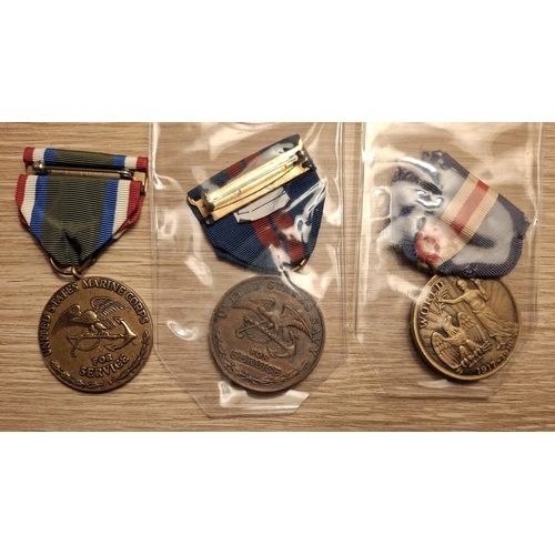 107 - Three USA medals, a WWI Connecticut victory medal, a Marine Corps 1908 Cuban Pacification medal and ... 