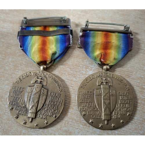 108 - Two USA WWI Victory medals, both with a bar, one for 