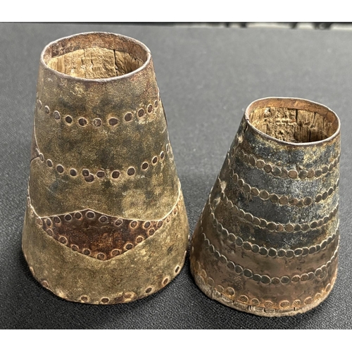 124 - Two antique, small north African cone pots with hammered metal outer and wooden inners (2)