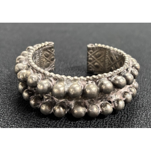 128 - Old African studded white metal bracelet,

approx 132 grams