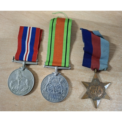 133 - Set of three WWII British medal set - the war medal, the defence medal and the 1939-1945 star (3)